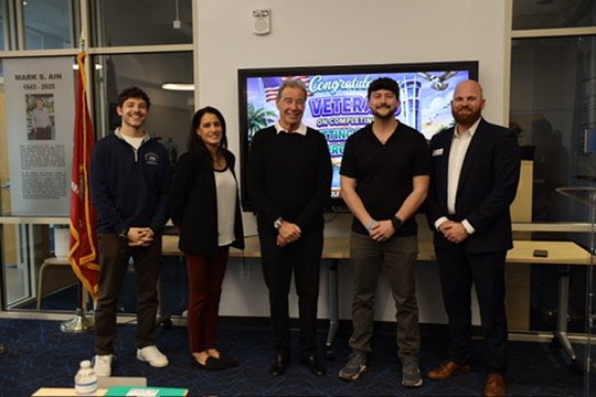 Zach with the judges at the FGCU Veterans Runway pitch event